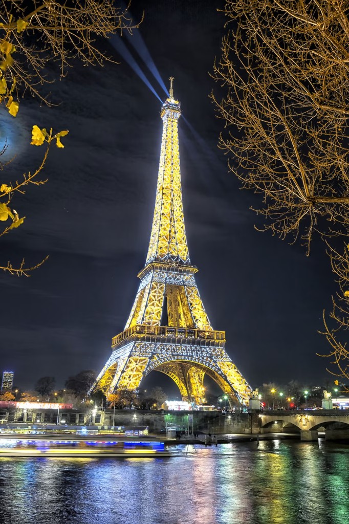 Eiffel Tower illuminated at night in Paris